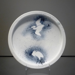 Plate with blown Ink Crane design
